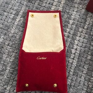 Cartier jewelry dust bag.